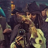 Jack Sparrow looking at his compass